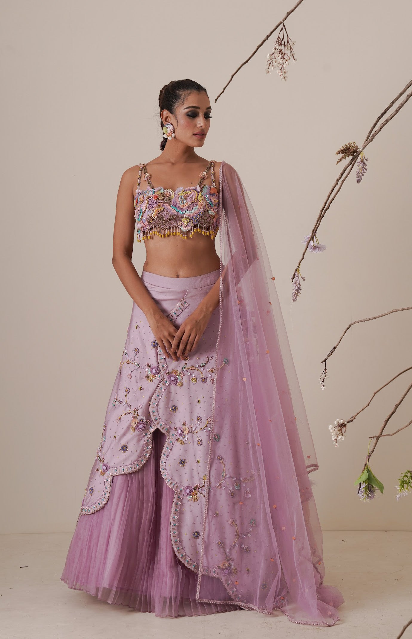 Lavender lehenga set pleated front detail and a applique embroidery dupatta.