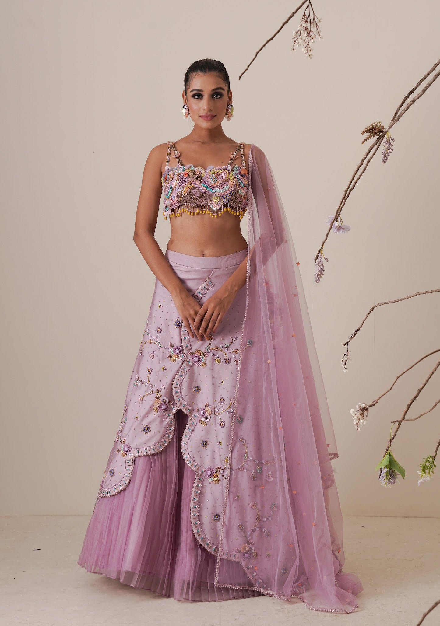 Lavender lehenga set pleated front detail and a applique embroidery dupatta.