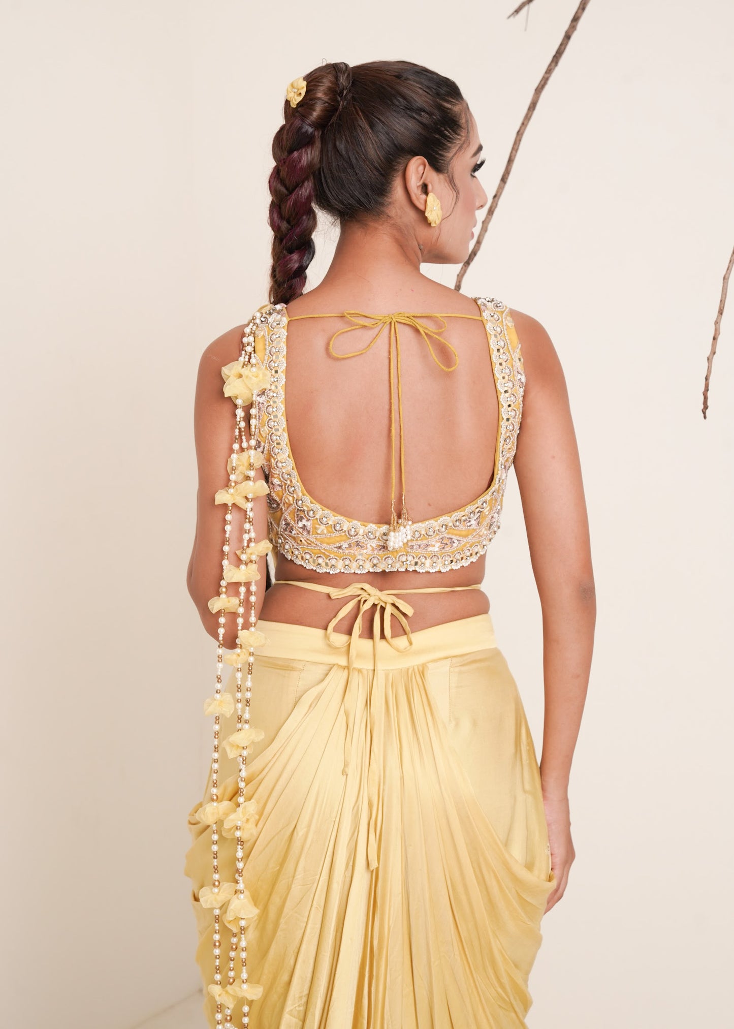 yellow pre-drape saree with shrug
