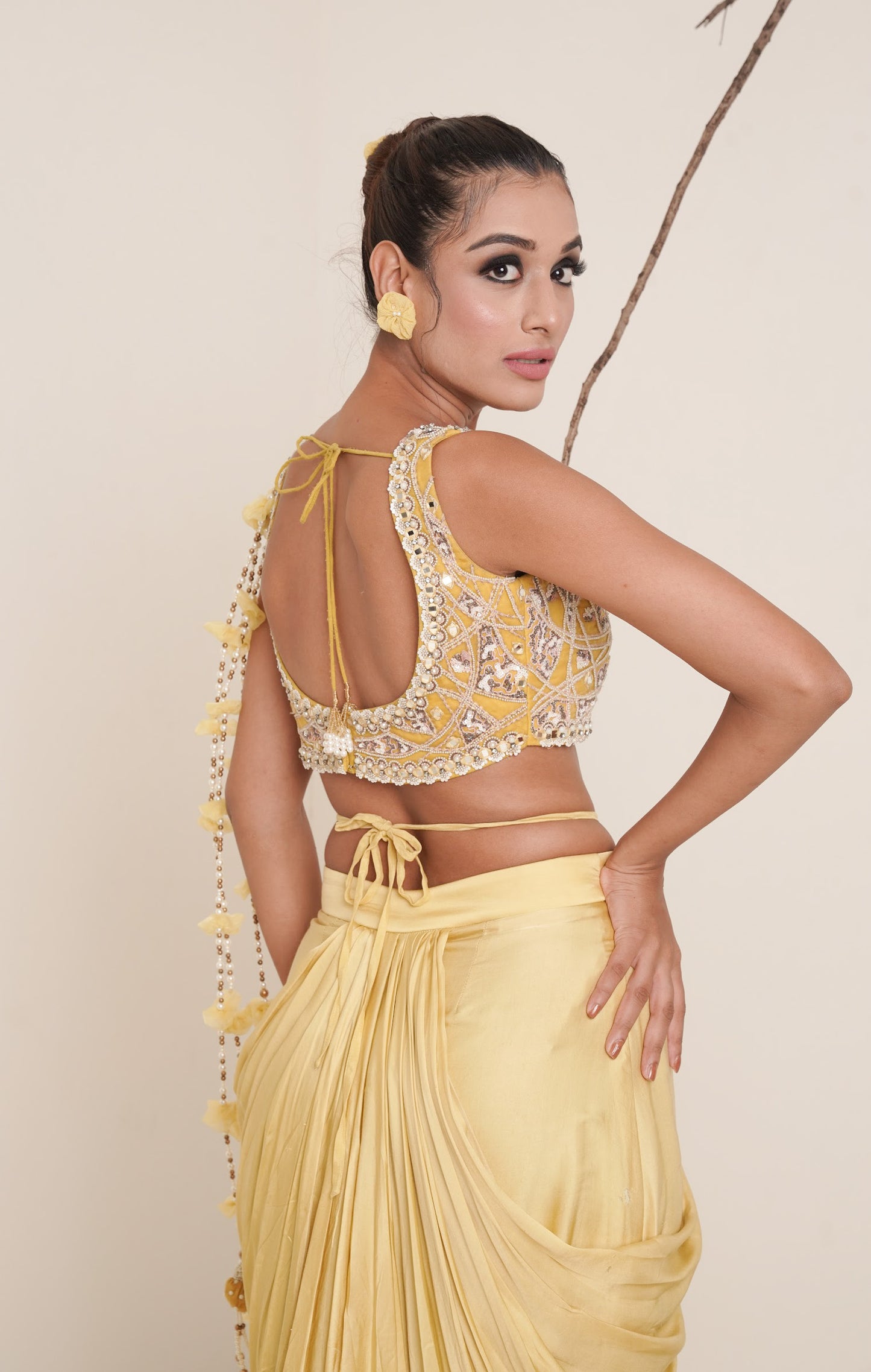 yellow pre-drape saree with shrug