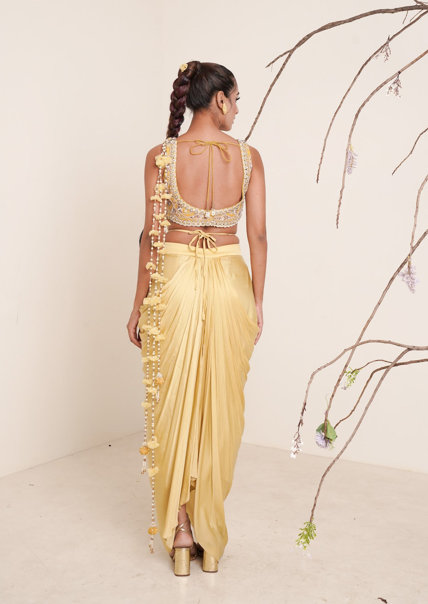 yellow pre-drape saree with shrug