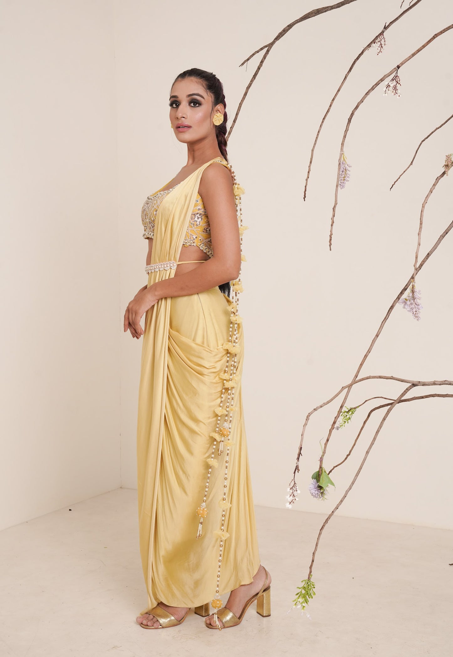 yellow pre-drape saree with shrug