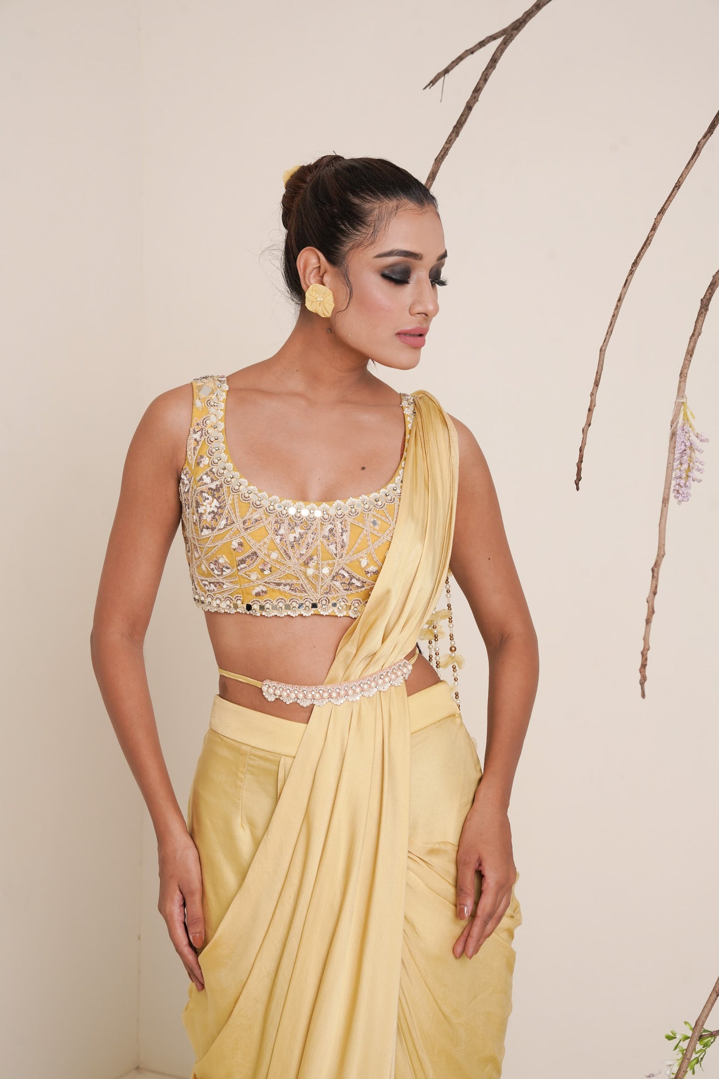 yellow pre-drape saree with shrug