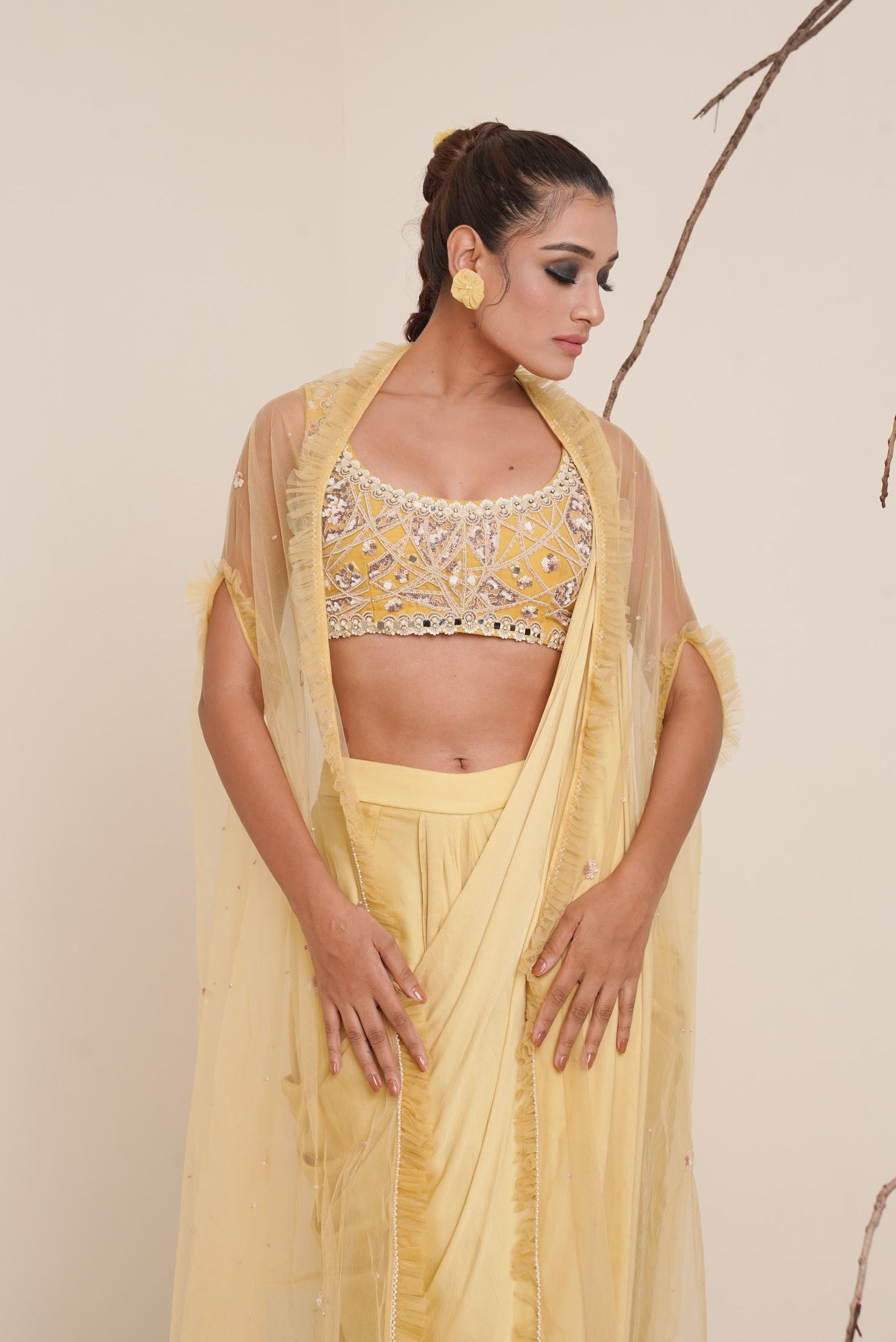 yellow pre-drape saree with shrug