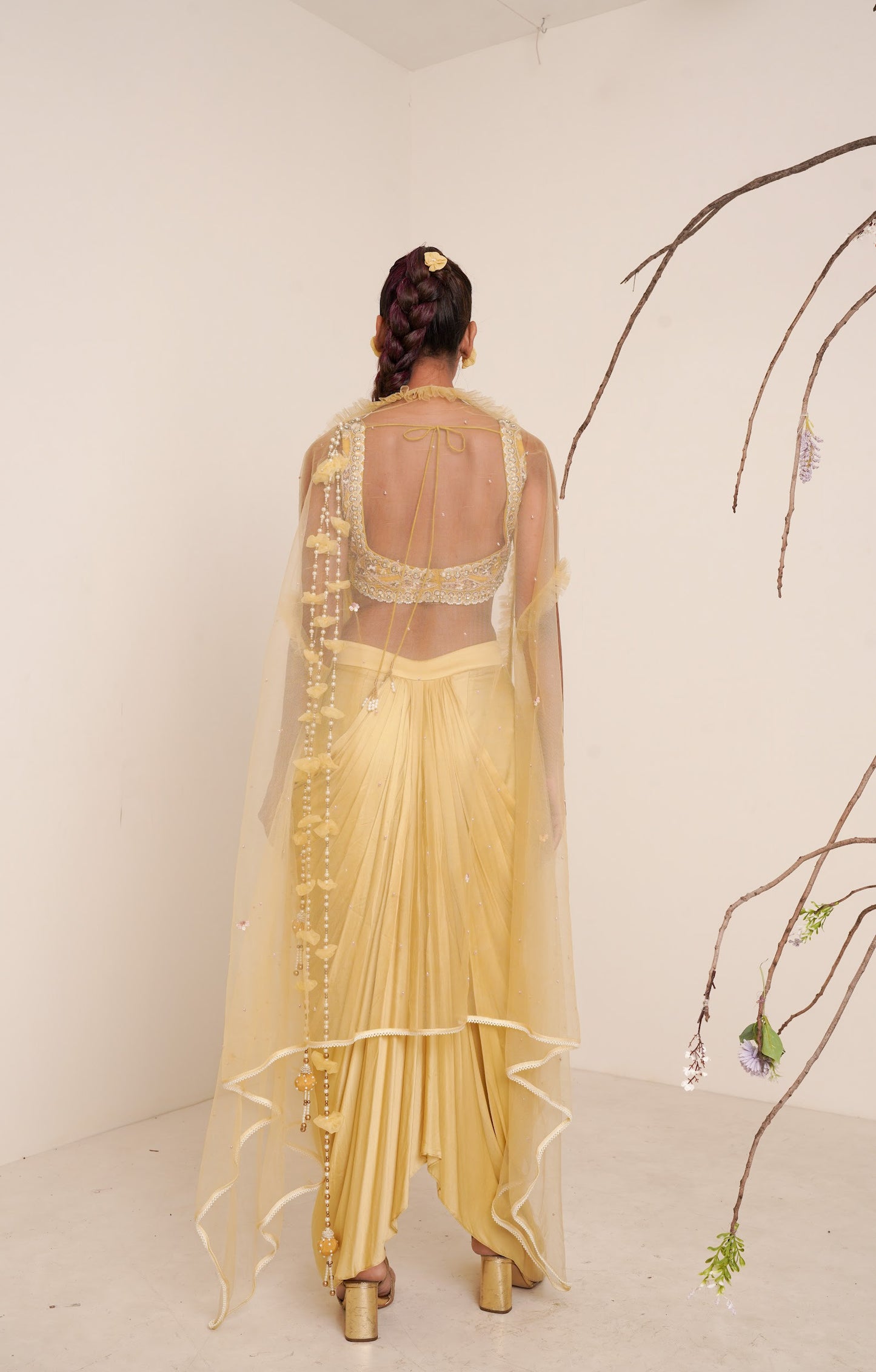 yellow pre-drape saree with shrug