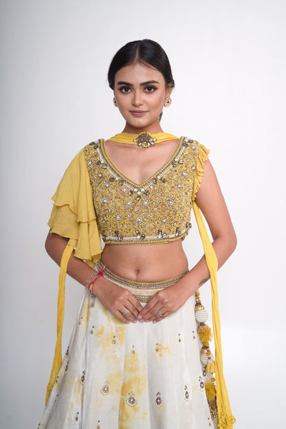 Yellow tye dye velvet lehenga set
