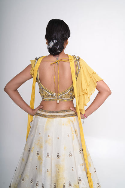 Yellow tye dye velvet lehenga set