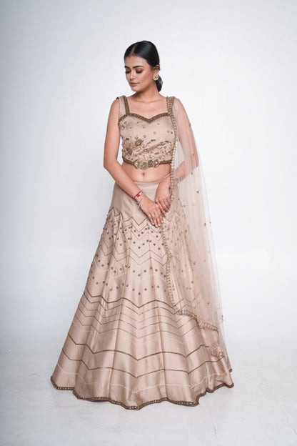Gold lehenga set with spaghetti blouse
