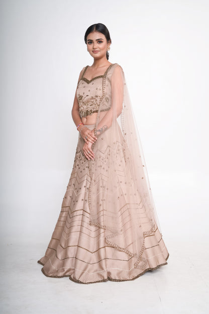 Gold lehenga set with spaghetti blouse