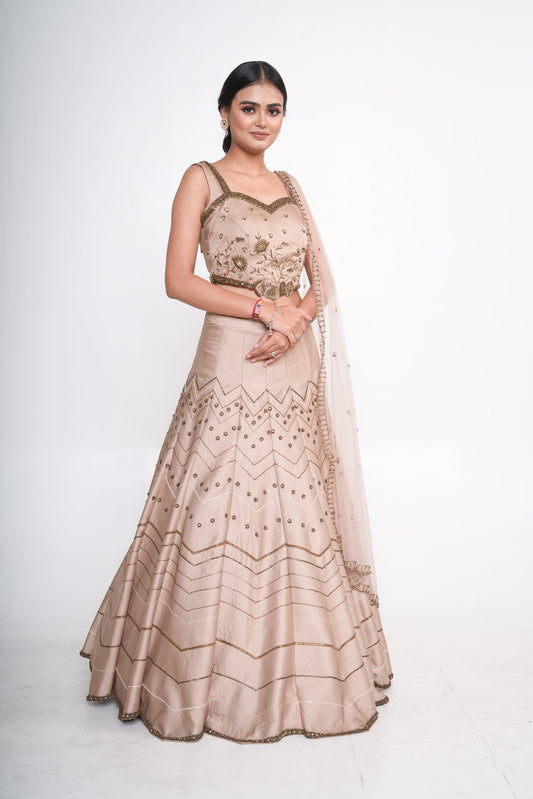 Gold lehenga set with spaghetti blouse