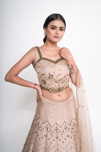 Gold lehenga set with spaghetti blouse