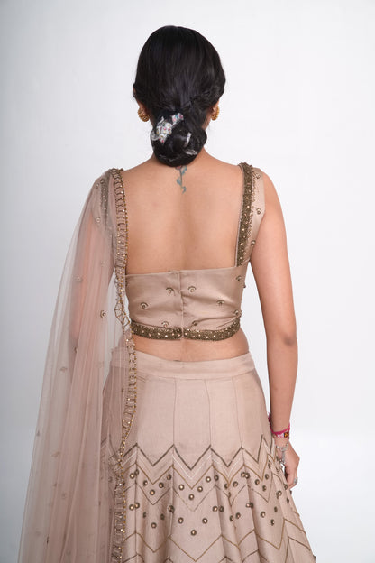 Gold lehenga set with spaghetti blouse