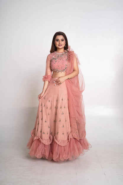 Pink layered lehenga set with pre drape net dupatta