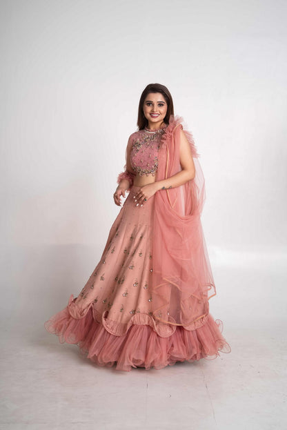 Pink layered lehenga set with pre drape net dupatta