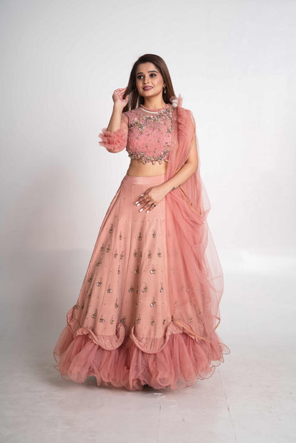 Pink layered lehenga set with pre drape net dupatta