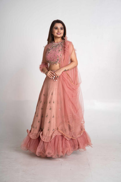 Pink layered lehenga set with pre drape net dupatta