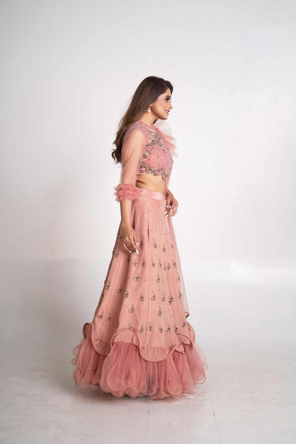 Pink layered lehenga set with pre drape net dupatta