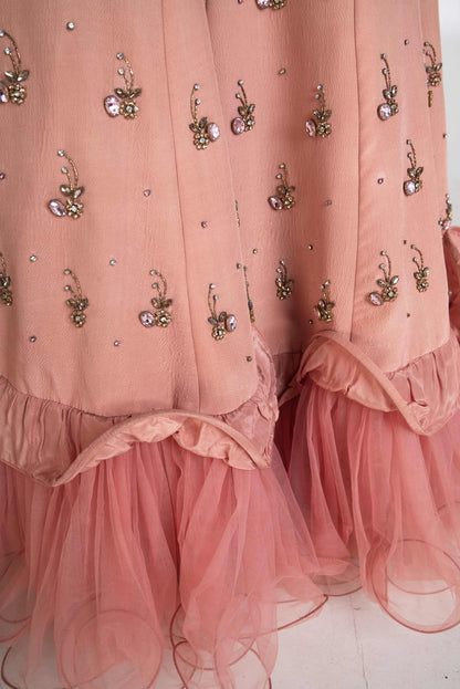 Pink layered lehenga set with pre drape net dupatta