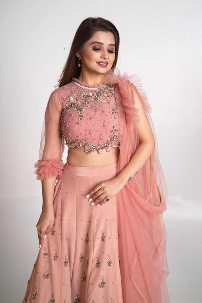 Pink layered lehenga set with pre drape net dupatta