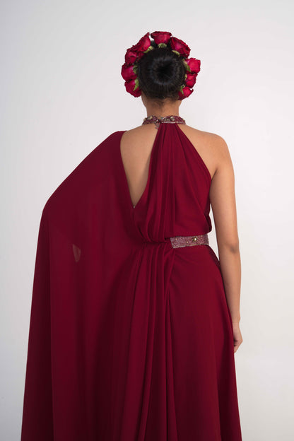 Maroon draped dress with fixed belt features at waist