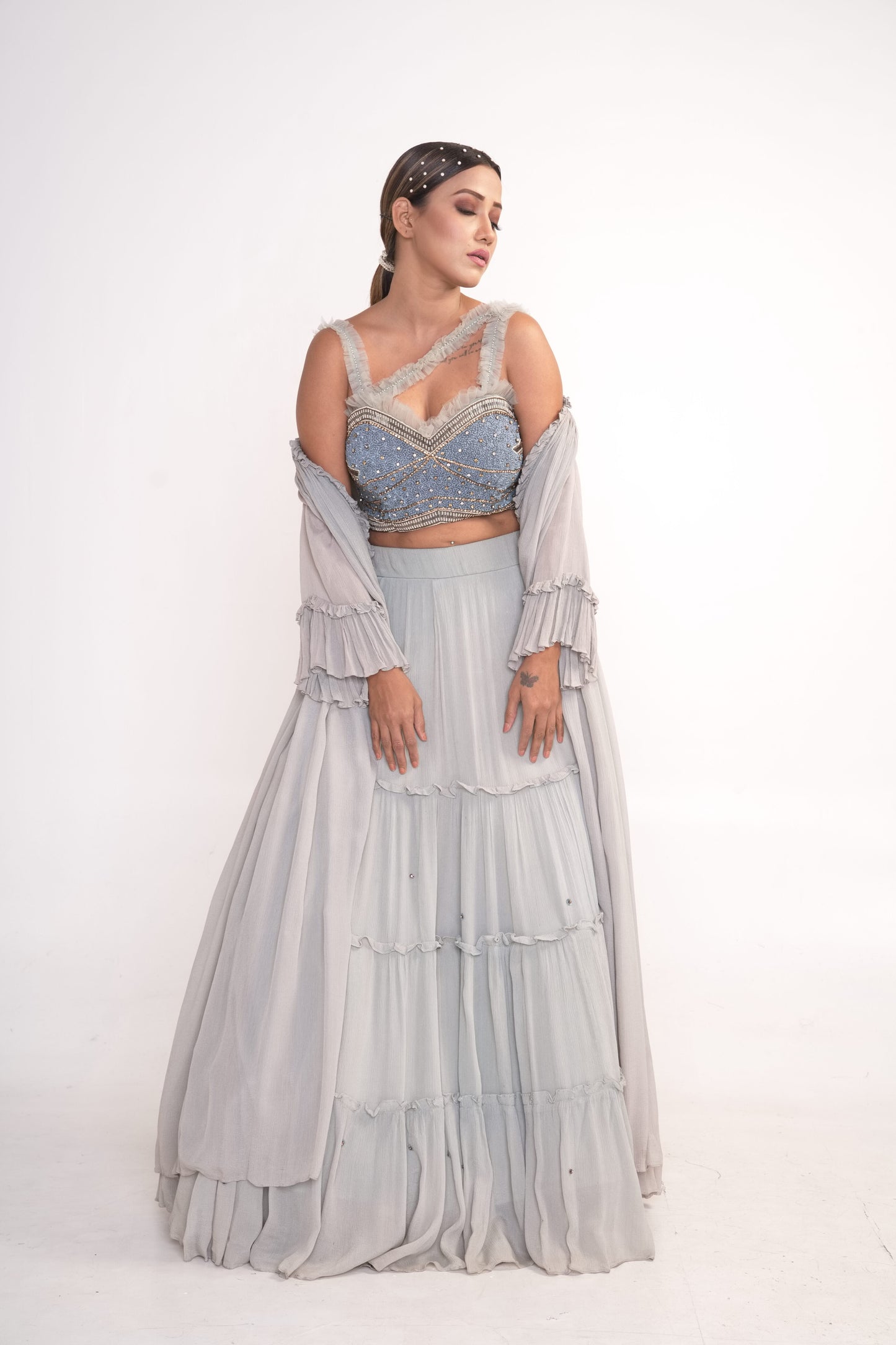 Powder blue lehenga set with blouse and chiffon shrug