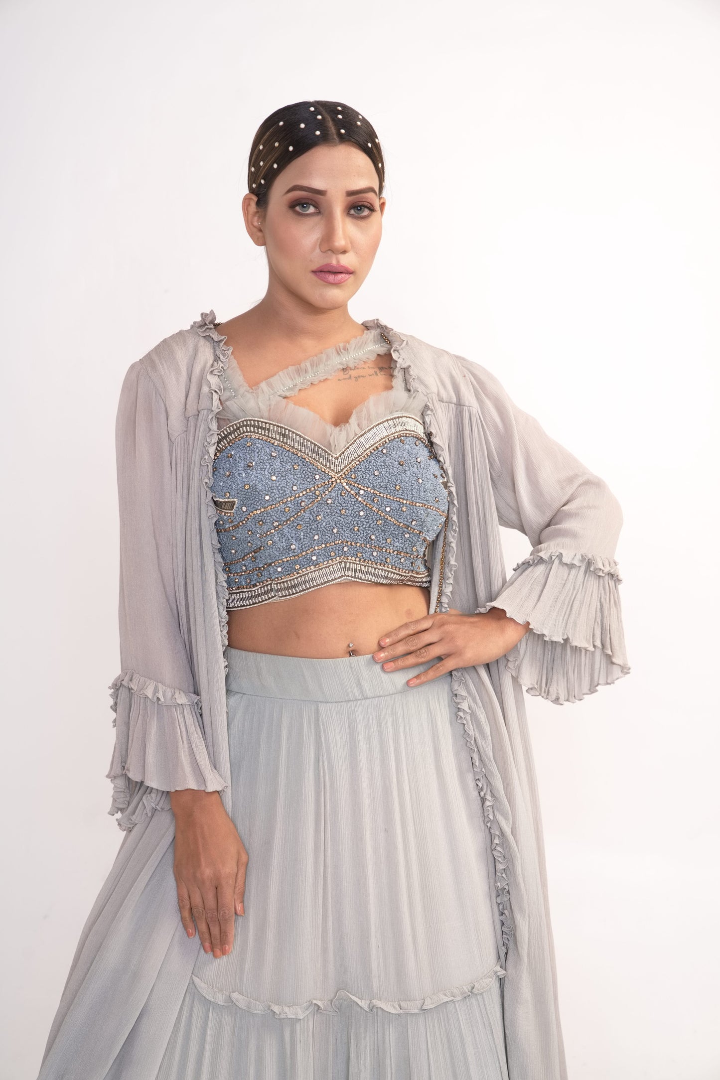 Powder blue lehenga set with blouse and chiffon shrug