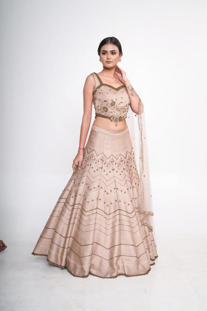 Gold lehenga set with spaghetti blouse