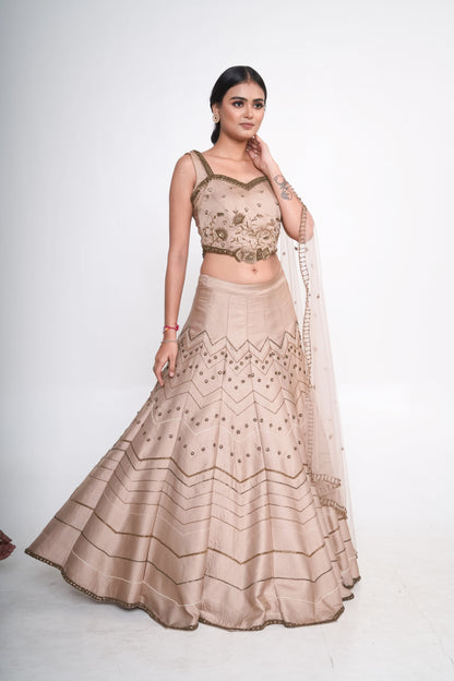 Gold lehenga set with spaghetti blouse